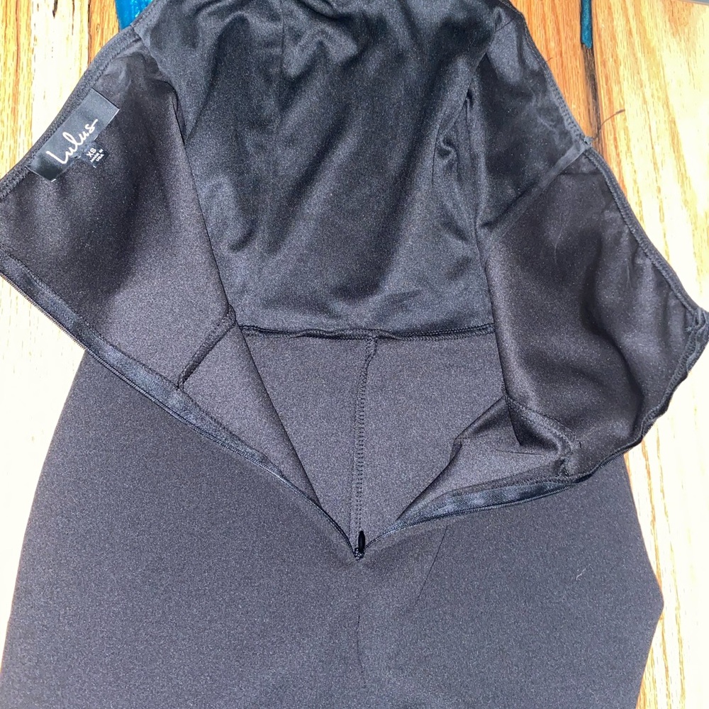 SOLD- Lulus After Midnight Black Ruffle Leg Strapless Jumpsuit - Picture 6 of 12